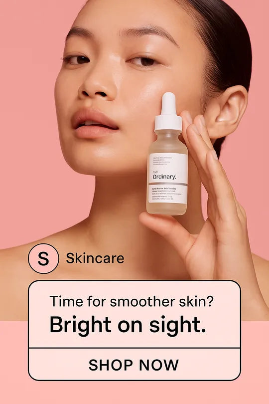 Person holding a skincare serum bottle with promotional text on a pink background